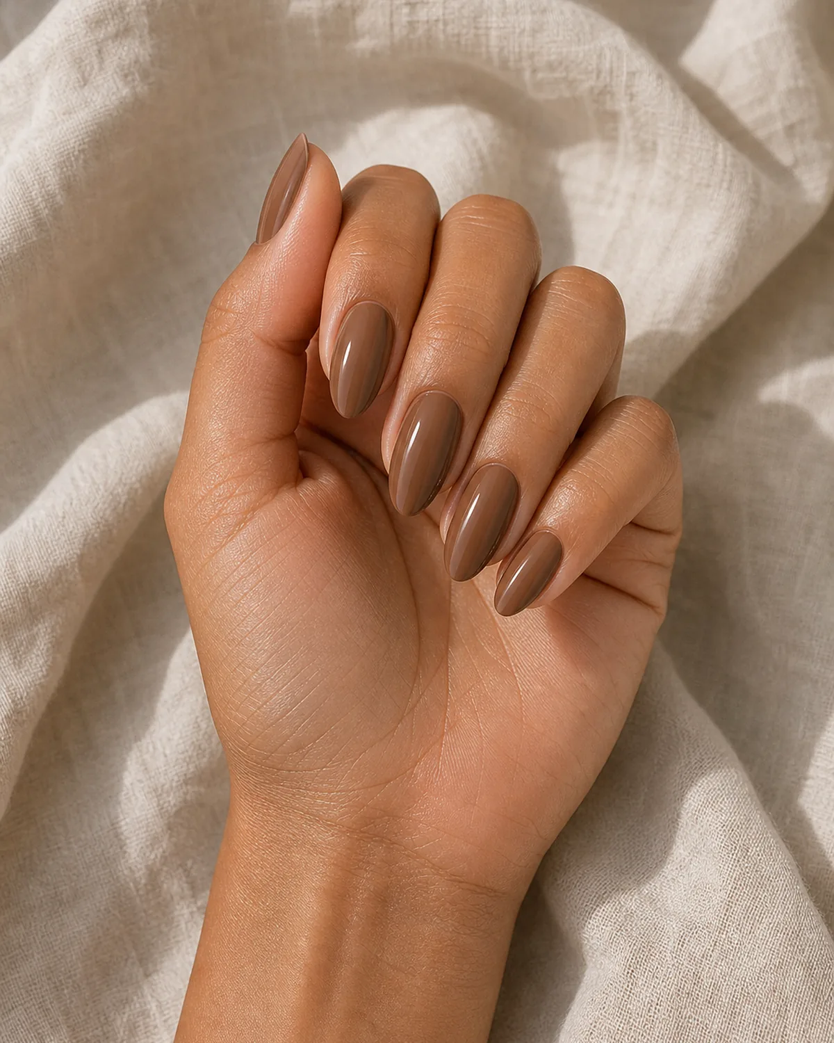 Milk chocolate cream on almond nails