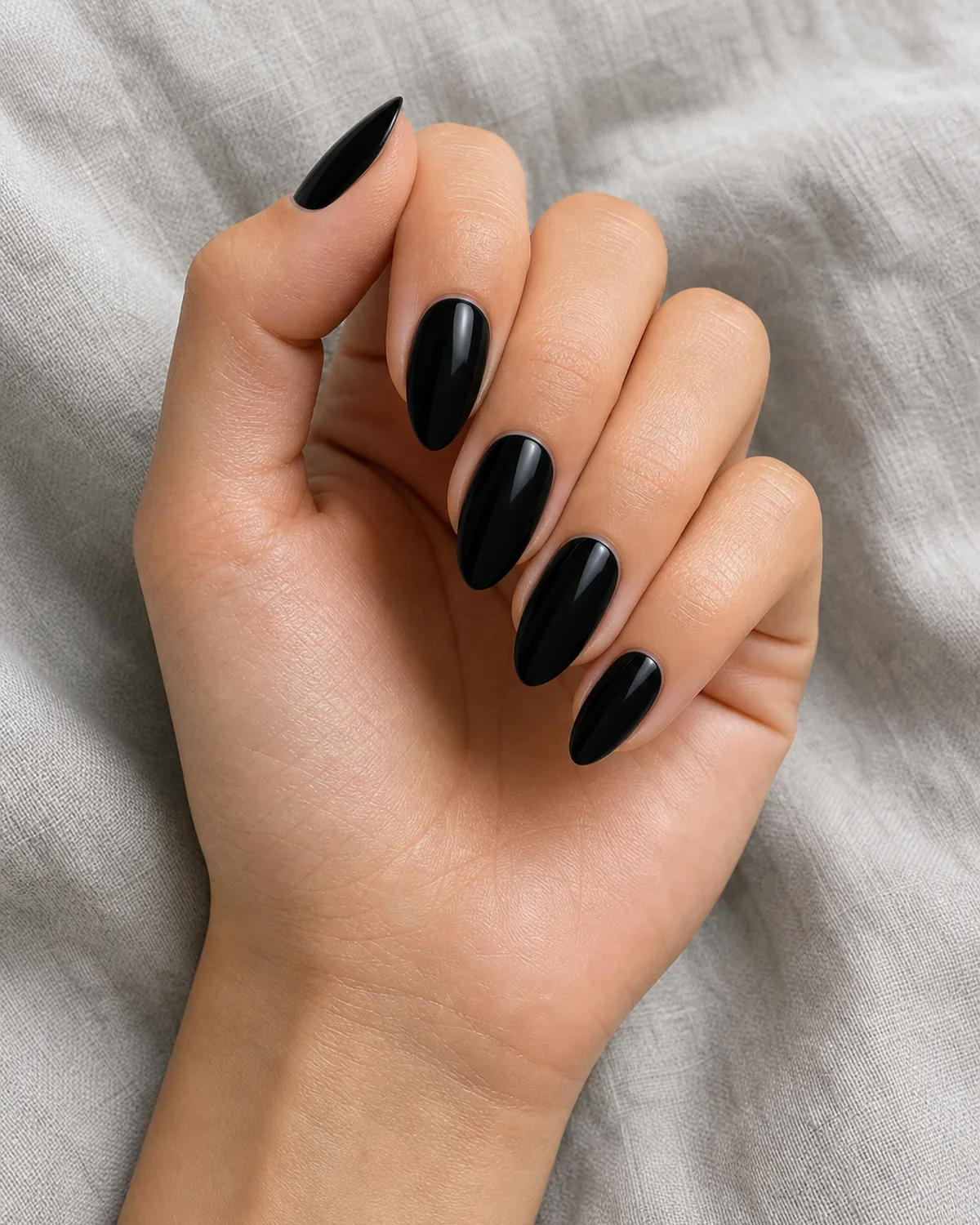 Jet black cream on almond nails