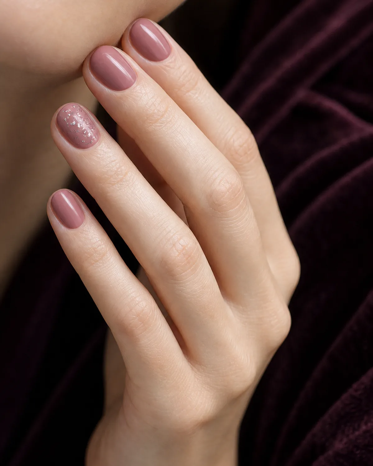 Dusty rose with silver fleck accent on short round nails