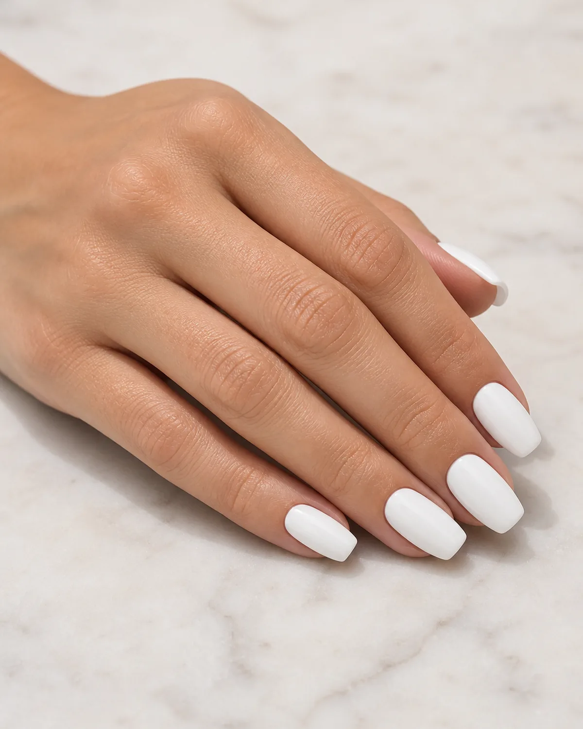 Clean bright white cream on short coffin nails