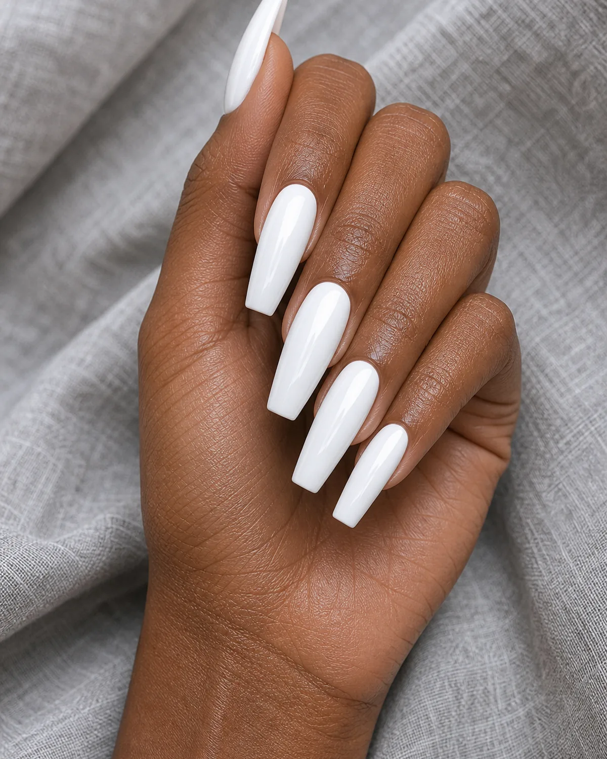 Porcelain white gloss on long coffin nails