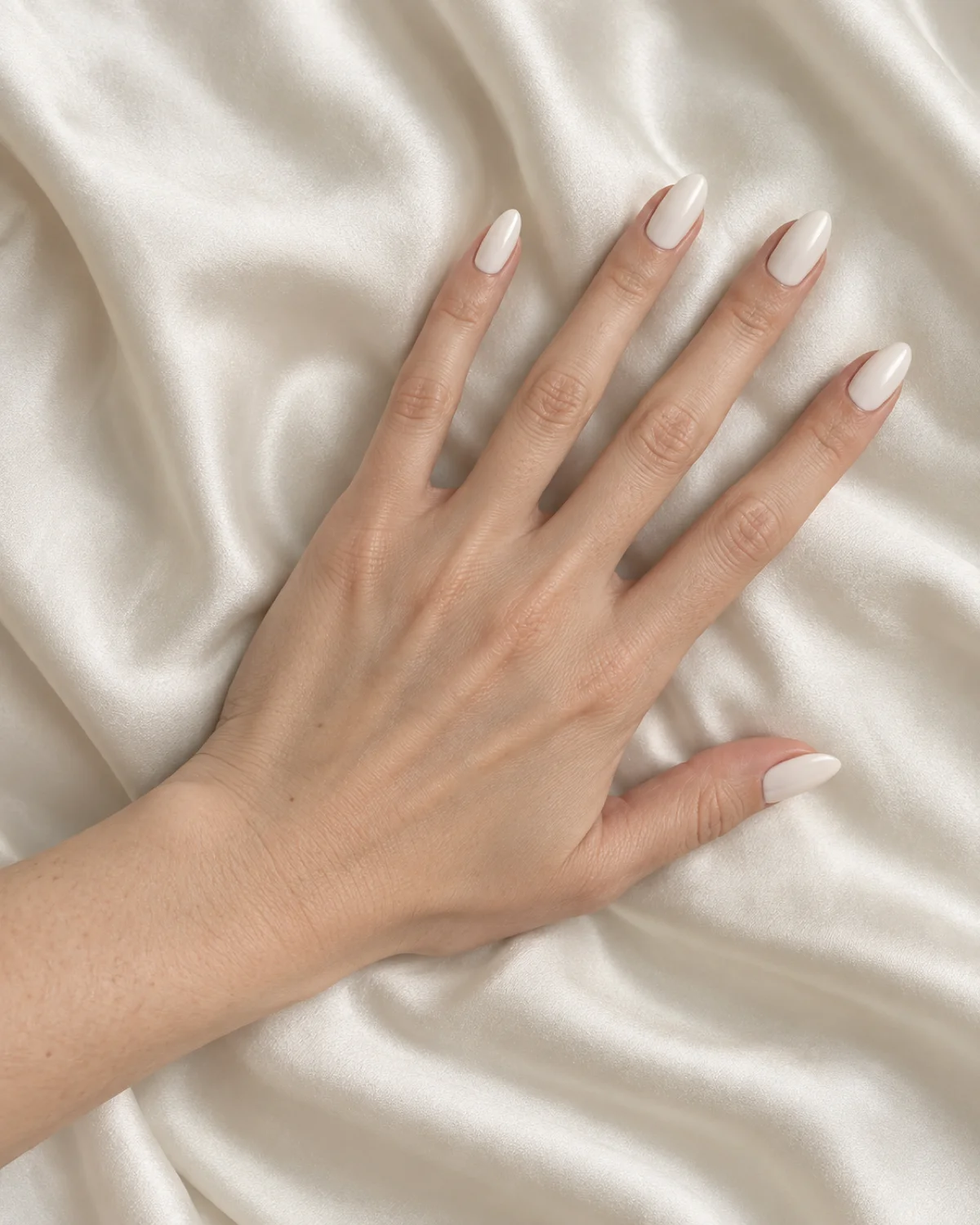 Milky White on Almond nail design close-up
