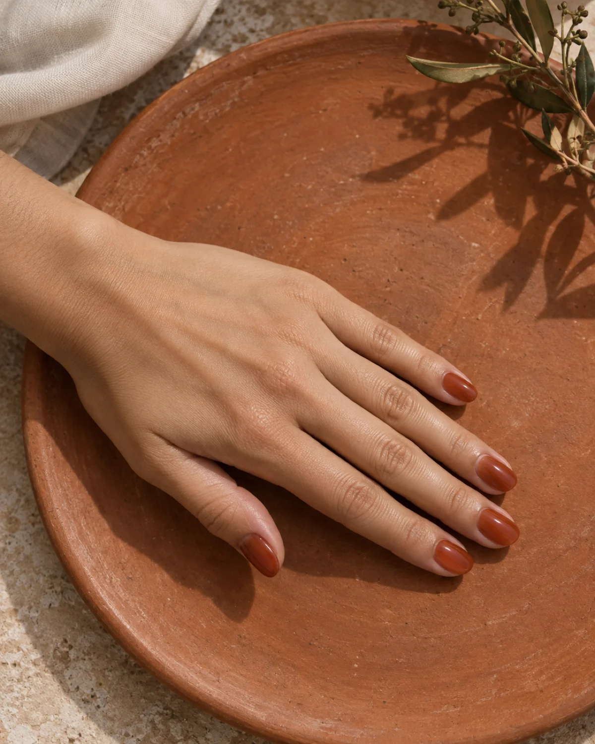 Sheer Terracotta on Round nail design close-up